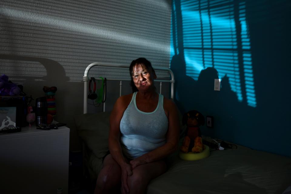 Yolanda Etter lived under a palm tree in San Pedro before having knee replacement surgery and being given the opportunity to live in the motel. 