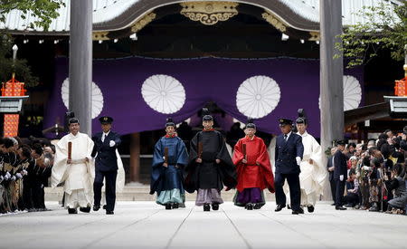 The Imperial envoys (C) visit the Yasukuni Shrine during its Annual Spring Festival in Tokyo April 22, 2015. REUTERS/Toru Hanai