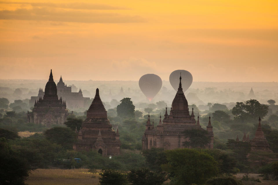 This December 2012 photo shows agriculture and a few of the over 2200 Pagodas found in Bagan, Myanmar. (AP Photo/Richard Camp)