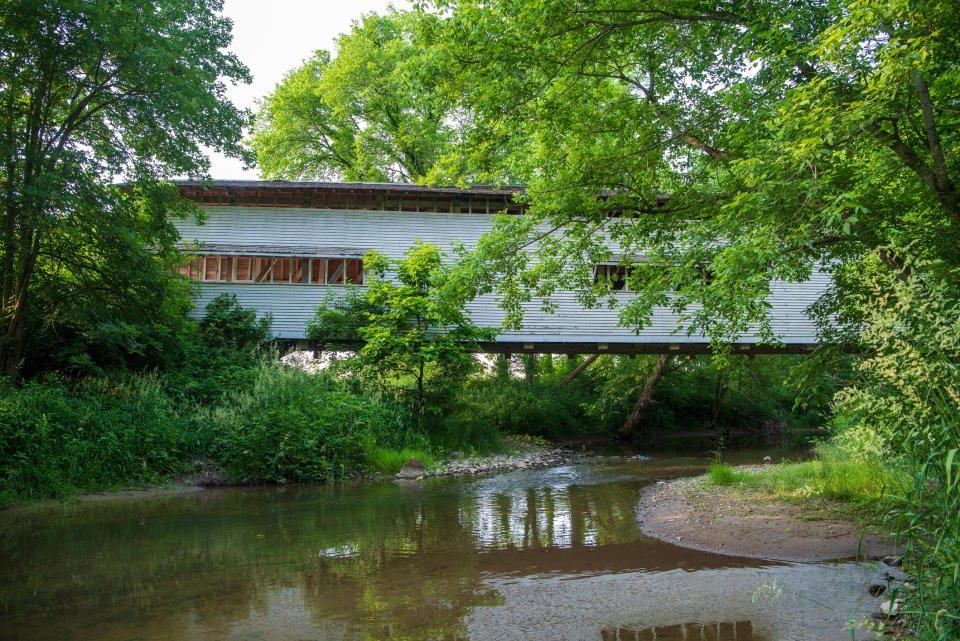 A blue covered bridge in Parke, County.