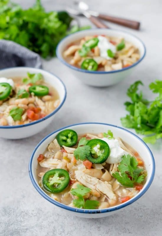 <p>Hearty and soul-warming, with endless ways to change it up to make it Whole 30, creamier, spicier, and even to cook it in your Instant Pot or on the stove. Get this <a href="https://www.rachelcooks.com/2018/04/11/slow-cooker-white-chicken-chili/" rel="nofollow noopener" target="_blank" data-ylk="slk:Slow Cooker White Chicken Chili;elm:context_link;itc:0;sec:content-canvas" class="link rapid-noclick-resp">Slow Cooker White Chicken Chili</a> recipe!</p>