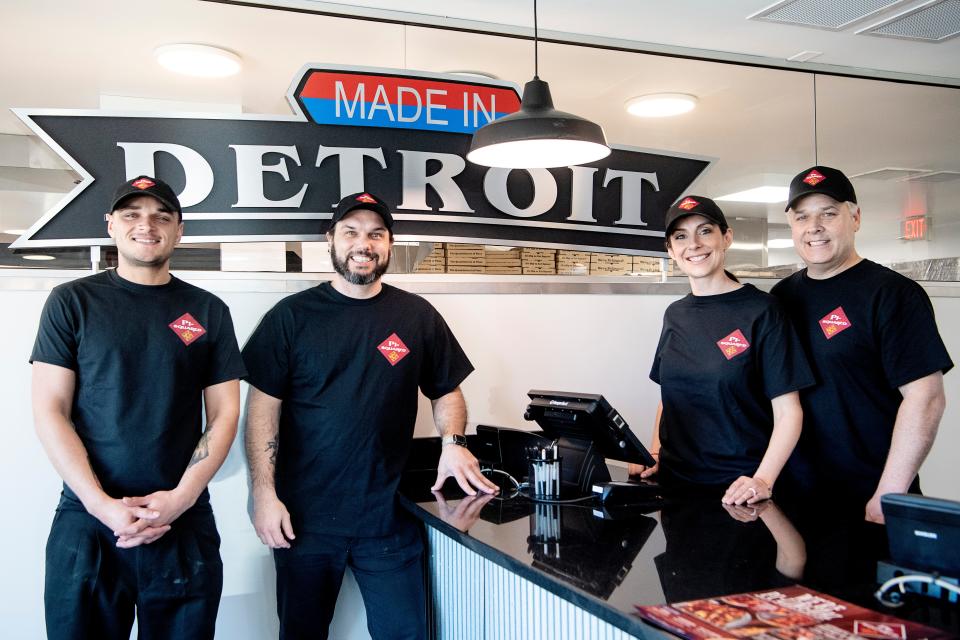 From left, Pi-Squared managers Cameron Harrington and Alex Garnsey, and owners Andria and Lonnie Lassiter March 1, 2022.