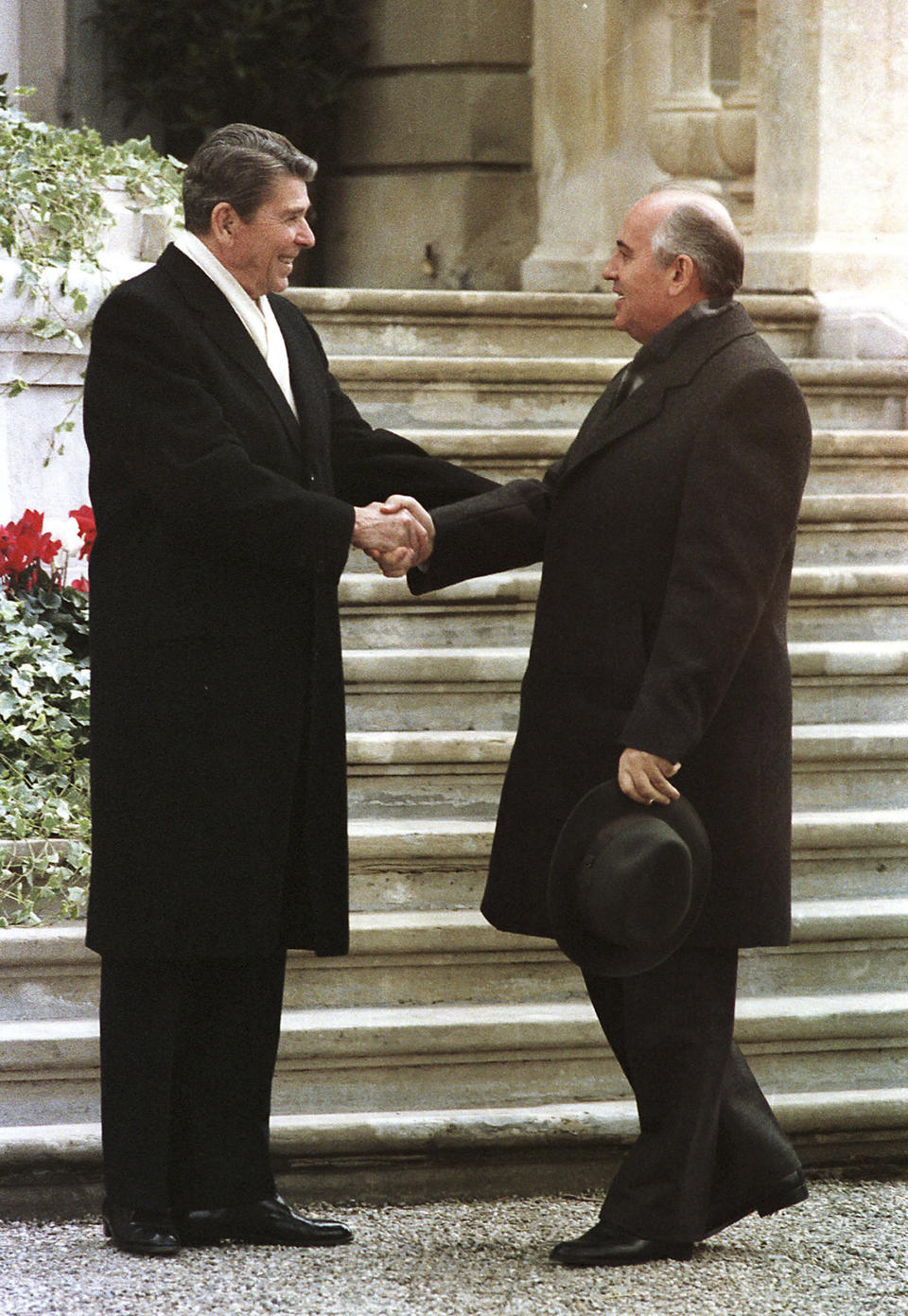 FILE - U.S. President Ronald Reagan, left, and Soviet leader Mikhail Gorbachev meet for the first time at the villa Fleur D'Eau at Versoix near Geneva, Nov. 19, 1985. Gorbachev signed two landmark arms agreements with the United States. He freed political prisoners, allowed open debate and multi-candidate elections, gave his countrymen freedom to travel and halted religious oppression. (AP Photo/Scott Stewart, File)