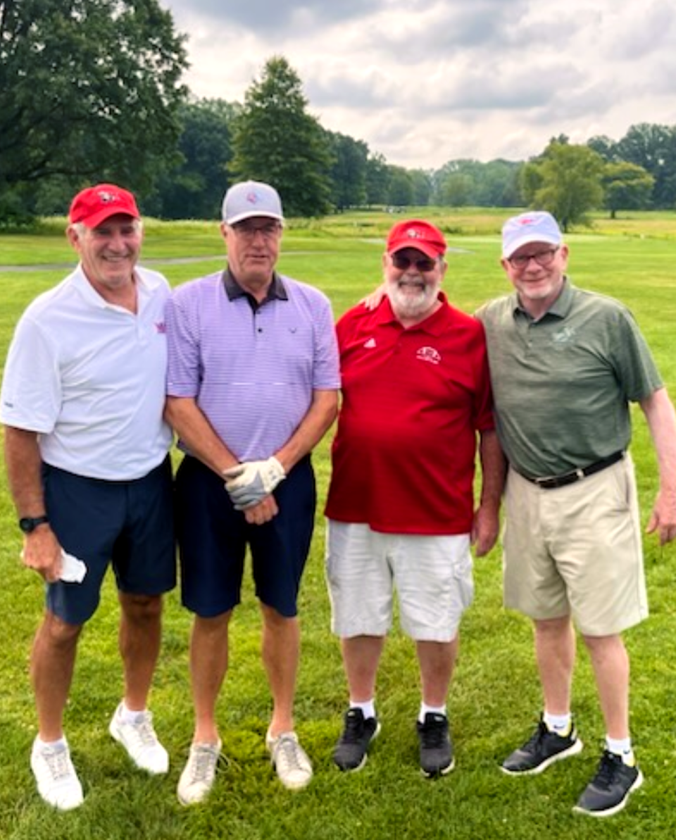 Teammates from Miami of Ohio's undefeated 1973 football team (left to right): Mike Monos, Bill Blind, Bill Driscoll John McVay.