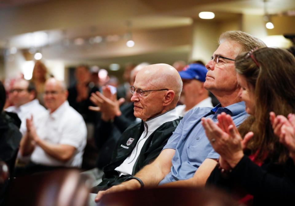 Springfield attorney Tom Strong receives a round of applause after he was named as the donor behind a $5 million gift to Missouri State to join Conference USA.