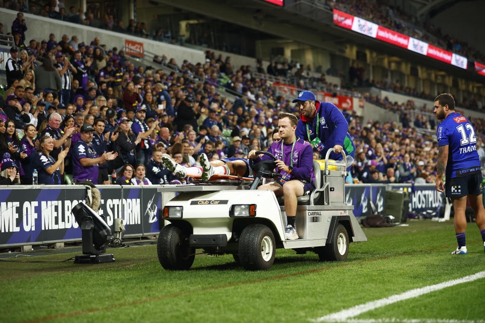 Dallin Watene-Zelezniak, pictured here leaving the field on a medicab during the Warriors' loss to the Storm.