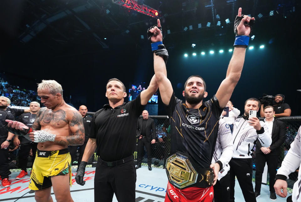 ABU DHABI, UNITED ARAB EMIRATES - OCTOBER 22: Islam Makhachev of Russia celebrates after his victory over Charles Oliveira of Brazil in their UFC lightweight championship fight during the UFC 280 event at Etihad Arena on October 22, 2022 in Abu Dhabi, United Arab Emirates. (Photo by Chris Unger/Zuffa LLC)