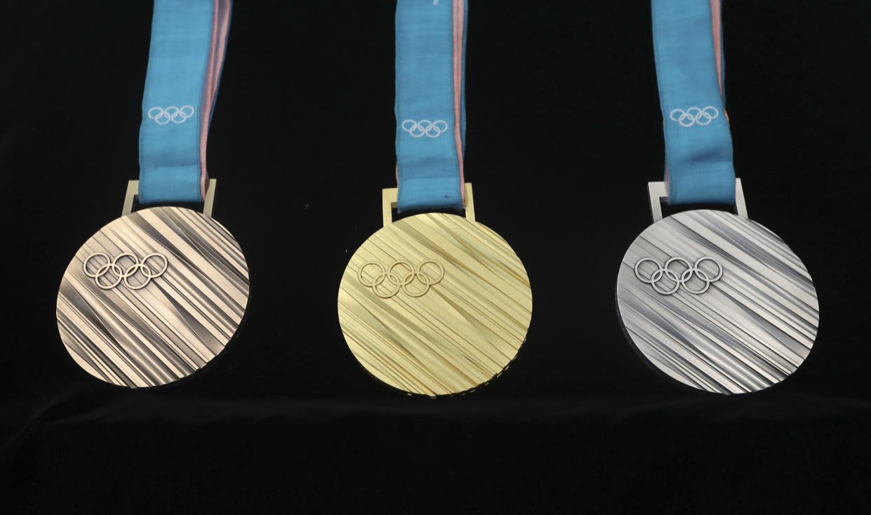 From left, the bronze, gold and silver medals for the PyeongChang 2018 Winter Olympics. (AP)