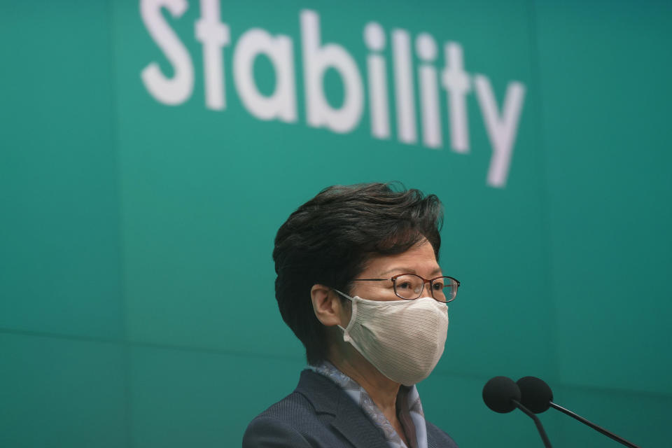 Hong Kong Chief Executive Carrie Lam listens to reporters questions during a press conference in Hong Kong, Tuesday, June 9, 2020. Lam said everyone should learn a lesson from last year's giant anti-government protests. But she did not say what lesson she has learned. Instead, she urged everyone to support the new national security legislation that the central government in Beijing is going to impose on Hong Kong. (AP Photo/Vincent Yu)