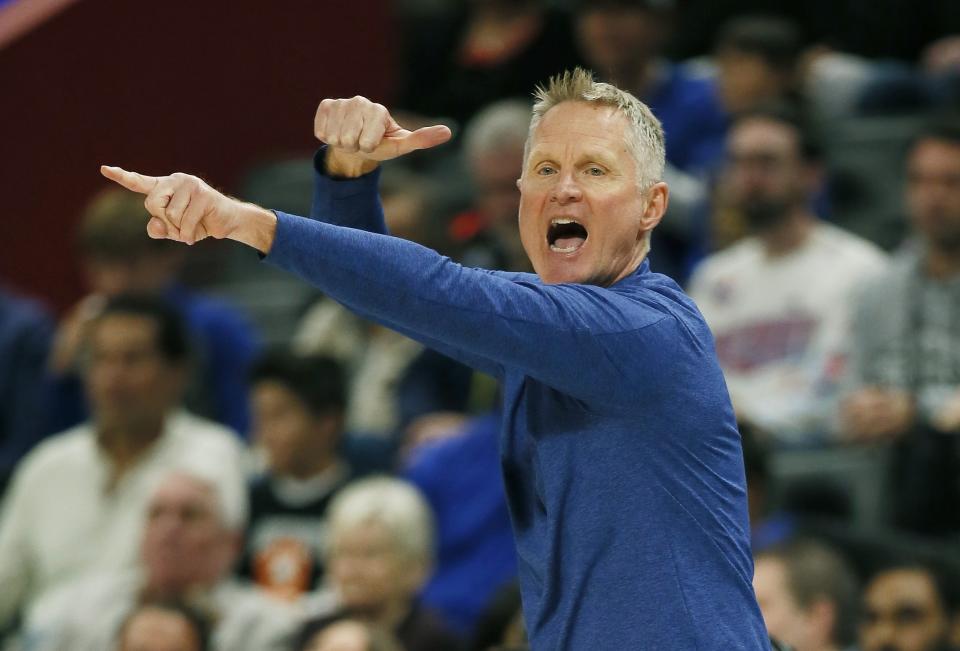 Golden State Warriors coach Stephen Kerr shouts to his team during the first half of an NBA basketball game against the Detroit Pistons, Sunday, Oct. 30, 2022, in Detroit. (AP Photo/Duane Burleson)