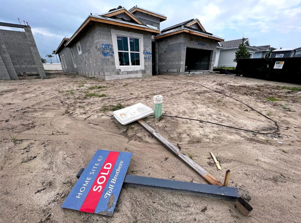 A home already sold under construction in the Windgate subdivision in Avenir, in Palm Beach Gardens, Wednesday, January 26, 2022. 