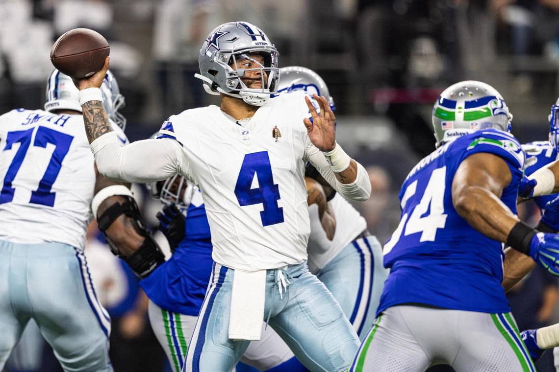 Dallas Cowboys quarterback Dan Prescott (4) throws against the Seattle Seahawks at AT&T Stadium in Arlington on Thursday. Chris Torres/ctorres@star-telegram.com