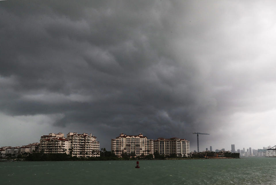 MIAMI BEACH, FL - SEPTEMBER 09:  Storm clouds are seen over Fisher Island as Hurricane Irma approaches on September 9, 2017 in Miami Beach, Florida. Florida is in the path of the Hurricane which may come ashore at  category 4.  (Photo by Joe Raedle/Getty Images)