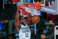 Boston Celtics' Tristan Thompson dunks against the Los Angeles Lakers during the second half of an NBA basketball game Thursday, April 15, 2021, in Los Angeles. (AP Photo/Ringo H.W. Chiu)