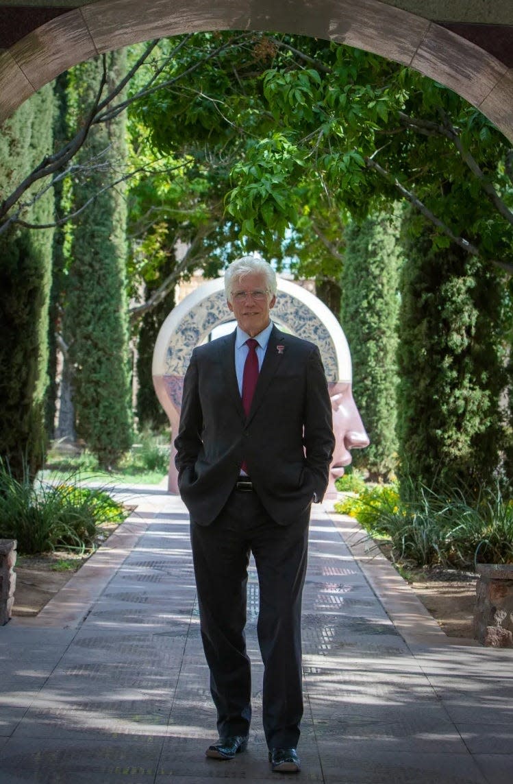 Richard Lange, president of Texas Tech University Health Sciences Center El Paso and dean of the Paul L. Foster School of Medicine, poses inside “El Intercambio,” a series of engraved sculptures that reference science and nature, July 1, 2024.