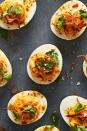 <p>Classic <a href="https://www.delish.com/cooking/recipe-ideas/a51851/classic-deviled-eggs-recipe/" rel="nofollow noopener" target="_blank" data-ylk="slk:deviled eggs;elm:context_link;itc:0;sec:content-canvas" class="link ">deviled eggs</a> get a smoky kick from harissa (Tunisian chili pepper paste) in this simple but flavorful deviled eggs recipe. Topped with crispy fried shallots and fresh cilantro, it may stray pretty far from the original, but it’s just as delicious.</p><p>Get the <strong><a href="https://www.delish.com/cooking/recipe-ideas/a40094636/harissa-deviled-eggs-recipe/" rel="nofollow noopener" target="_blank" data-ylk="slk:Harissa Deviled Eggs recipe;elm:context_link;itc:0;sec:content-canvas" class="link ">Harissa Deviled Eggs recipe</a></strong>.</p>