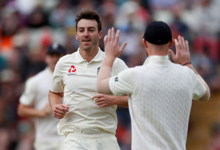 Cricket - England vs West Indies - First Test - Birmingham, Britain - August 19, 2017 England's Toby Roland-Jones celebrates the LBW of West Indies' Shane Dowrich Action Images via Reuters/Paul Childs