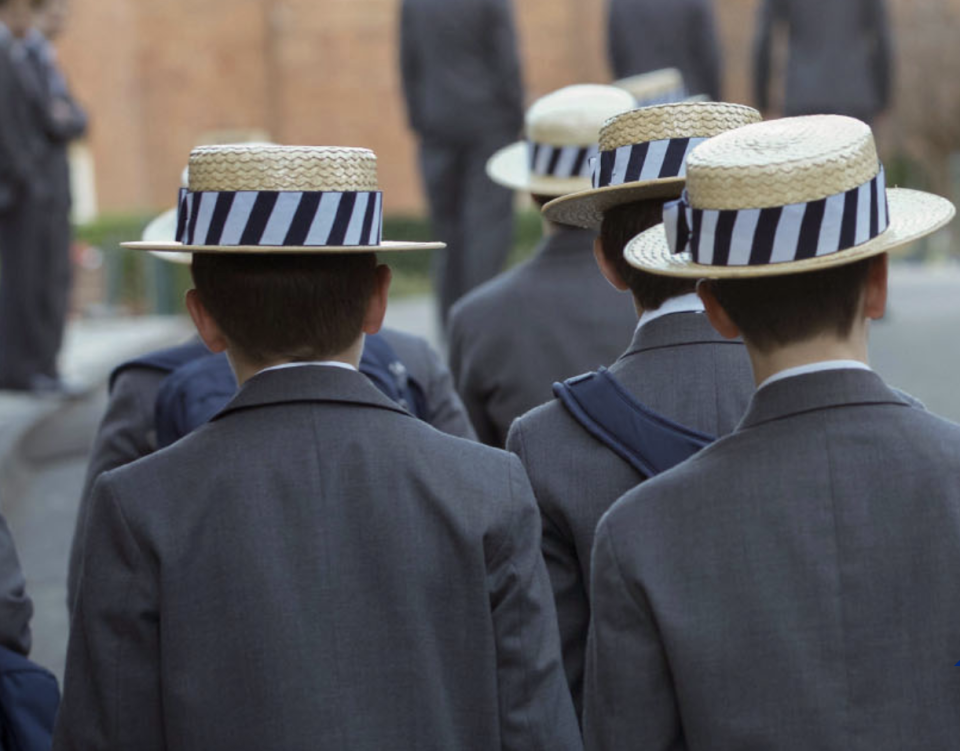 Pictured are the backs of Shore School students wearing the uniform. 
