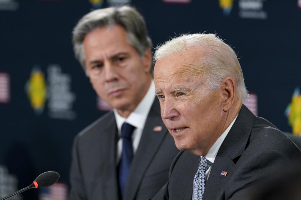 President Joe Biden speaks during the first U.S.-Pacific Island Country Summit at the State Department in Washington, Thursday, Sept. 29, 2022. Secretary of State Antony Blinken listens at left. (AP Photo/Susan Walsh)