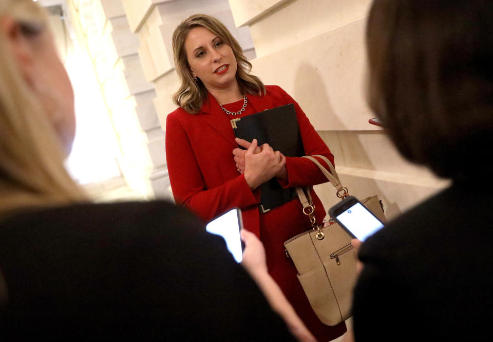 Rep. Katie Hill (D-Calif.) answers questions from reporters following her final speech on the floor of the House of Representatives. (Photo: Win McNamee via Getty Images)