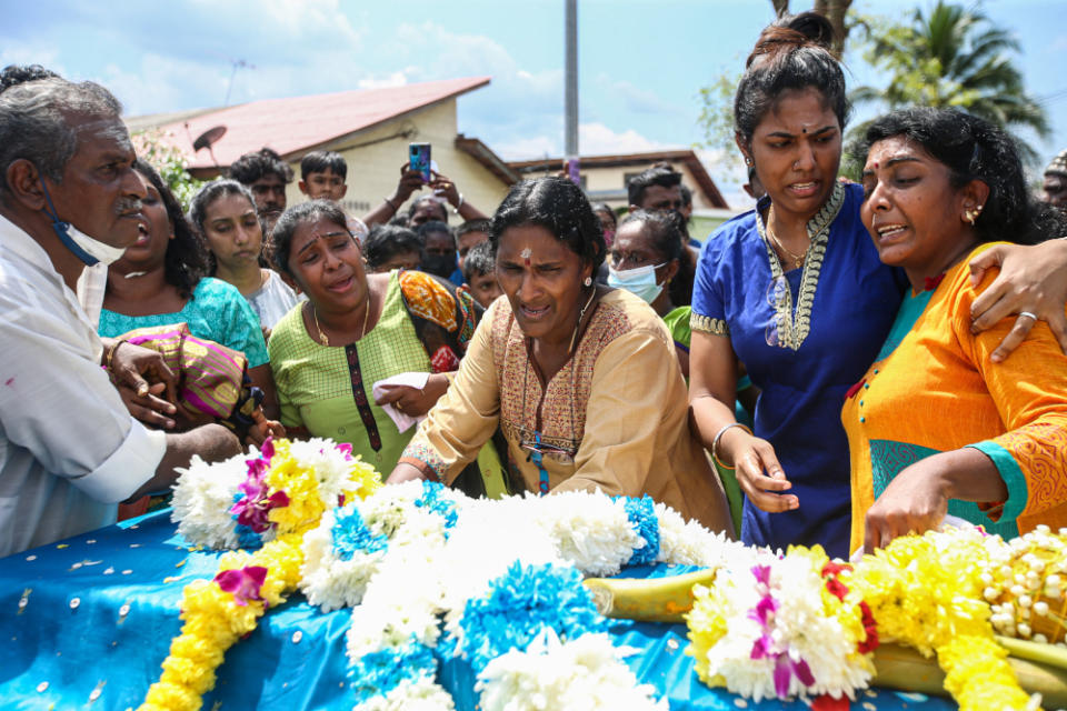 Nagaenthran’s mother Panchalai Supermaniam, 60, in tears as she pays her final respects to her son at her home in Tanjung Rambutan, Perak, April 29, 2022. — Picture by Farhan Najib