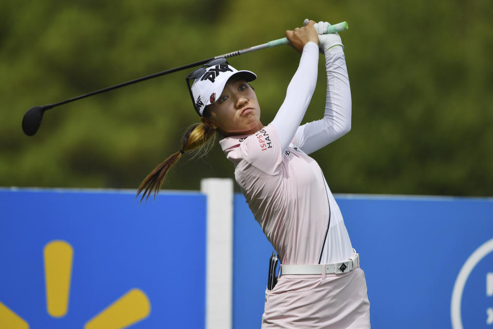 Lydia Ko, of New Zealand, watches her drive off the 13th tee during the first round of the LPGA Walmart NW Arkansas Championship golf tournament, Friday, Sept. 24, 2021, in Rogers, Ark. (AP Photo/Michael Woods)