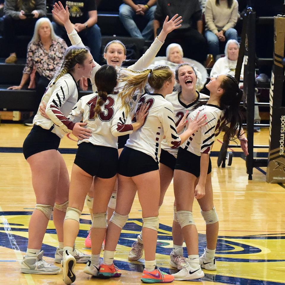 Elmira celebrates during a 3-2 win over Corning in the Section 4 Class AAA volleyball final Nov. 4, 2023 at Corning-Painted Post High School.