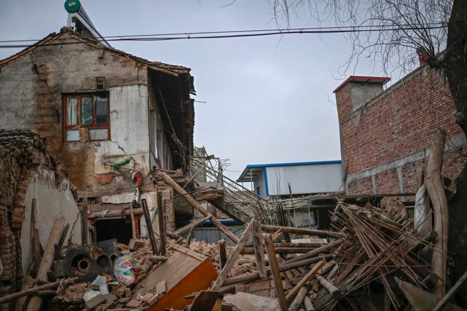 A general view shows a collapsed building after an earthquake in Dahejia, Jishishan County (AFP via Getty Images)