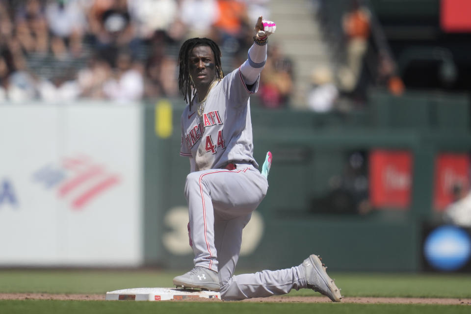 Cincinnati Reds' Elly De La Cruz gestures toward teammates after hitting a double against the San Francisco Giants during the eighth inning of a baseball game in San Francisco, Wednesday, Aug. 30, 2023. (AP Photo/Jeff Chiu)