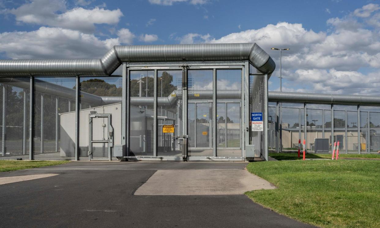 <span>The high-security main gate of the Melbourne immigration detention centre in Broadmeadows. </span><span>Photograph: The Washington Post/Getty Images</span>