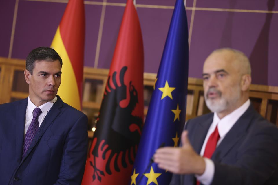 Albania's Prime Minister Edi Rama, right, speaks during a news conference with his Spanish counterpart Pedro Sanchez at the government headquarters in Tirana, Albania, Monday, Aug. 1, 2022. Sanchez is in Albania for a one-day official visit. (AP Photo/Franc Zhurda)