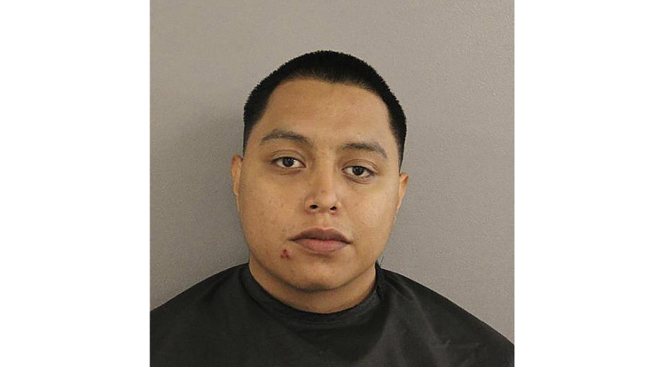 This image provided by the Elgin Police Department shows Pedro Tello Rodriguez Jr. who is charged with engaging in deadly conduct, a third-degree felony. The man shot and wounded two cheerleaders in a Texas supermarket parking lot after one of them said she mistakenly got into his car thinking it was her own — the latest in a string of recent U.S. shootings apparently sparked by someone showing up at the wrong place. (Elgin Police Department via AP)