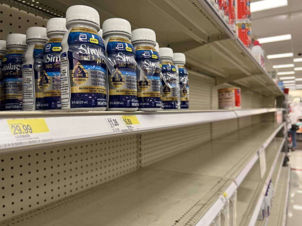 Similac baby formulas are seen at empty baby formula section shelves at a Target store due to shortage in the availability of baby food on May 17, 2022, in New Jersey, United States.