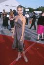 <p>The two-strap high heel is still very much around today, but it paired perfectly with the simplicity of a '90s silk slip dress-much like the one J. Lo wore to the Teen Choice Awards. </p>