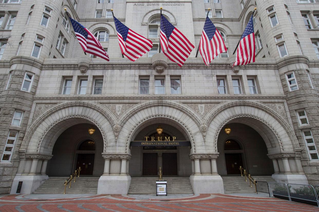 The Old Post Office Pavilion Clock Tower, which remains open during the partial government shutdown, above the Trump International Hotel, Jan. 4, 2019, in Washington.