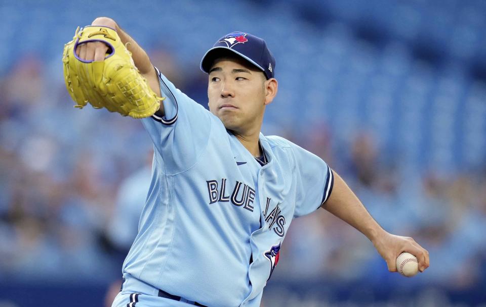 Toronto Blue Jays starting pitcher Yusei Kikuchi (16) throws during the first inning of a baseball game against the Seattle Mariners in Toronto, Monday, May 16, 2022. (Nathan Denette/The Canadian Press via AP)