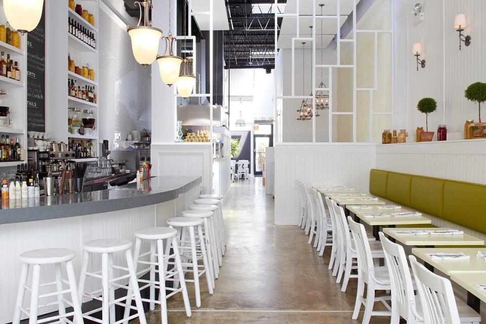 A contemporary restaurant with a white palette