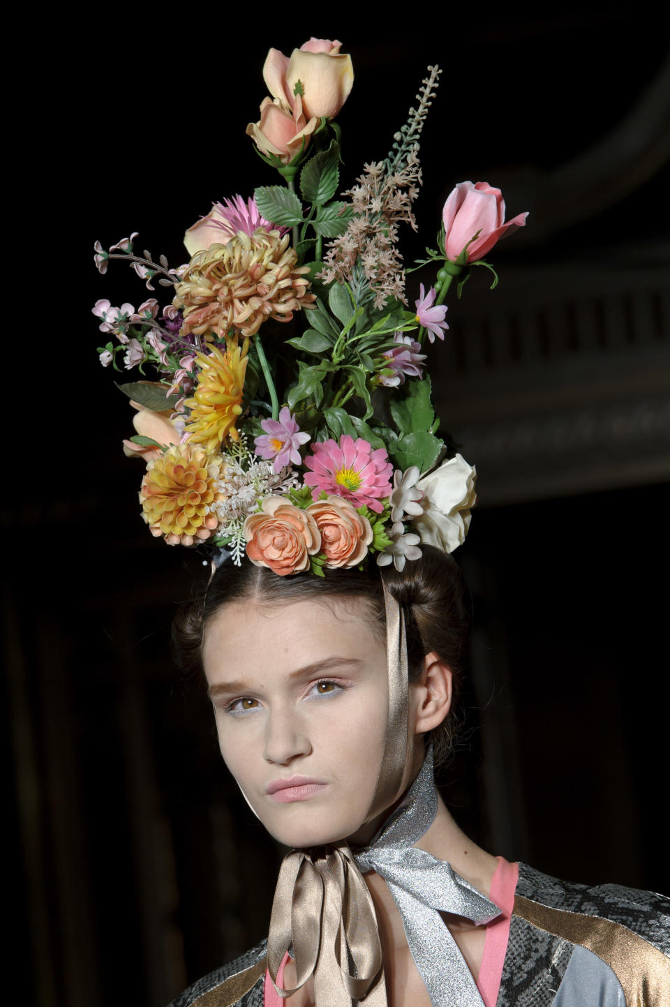 A model wears a design created by Pam Hogg during London Fashion Week Spring/Summer 2014, at the Freemasons' Hall in central London, Monday, Sept. 16, 2013. (Photo by Jonathan Short/Invision/AP)