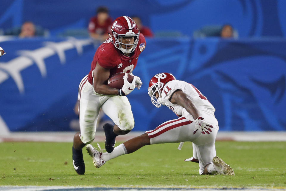 MIAMI GARDENS, FL - DECEMBER 29: Josh Jacobs #8 of the Alabama Crimson Tide runs past the attempted take by Parnell Motley #11 of the Oklahoma Sooners during the College Football Playoff Semifinal at the Capital One Orange Bowl at Hard Rock Stadium on December 29, 2018 in Miami Gardens, Florida. (Photo by Joel Auerbach/Getty Images)
