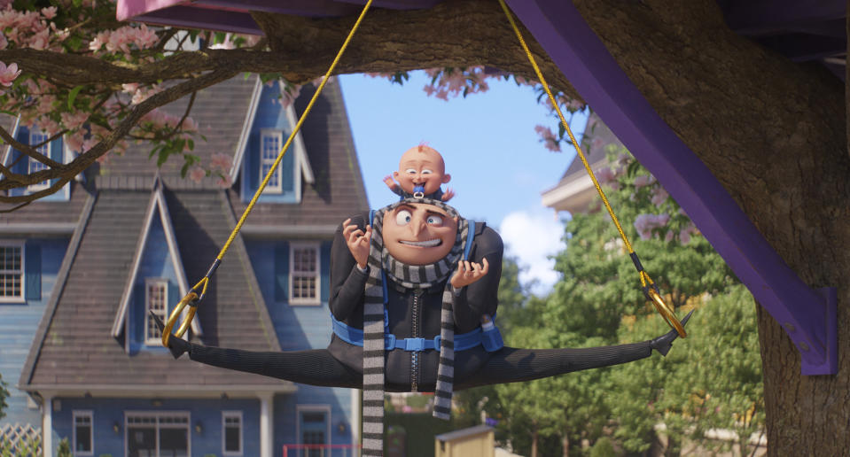 This image release by Illumination & Universal Pictures shows Gru, voiced by Steve Carell, and Gru Jr. in a scene from "Despicable Me 4," (Illumination & Universal Pictures via AP)