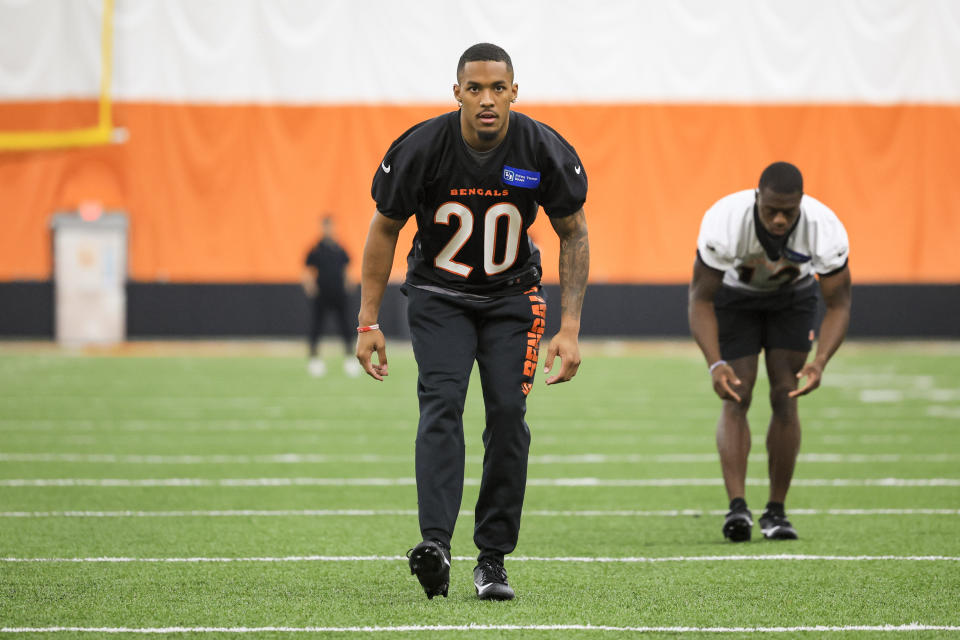 Cincinnati Bengals' DJ Turner II stretches on the field at the NFL football team's rookie minicamp in Cincinnati, Friday, May 12, 2023. (AP Photo/Aaron Doster)