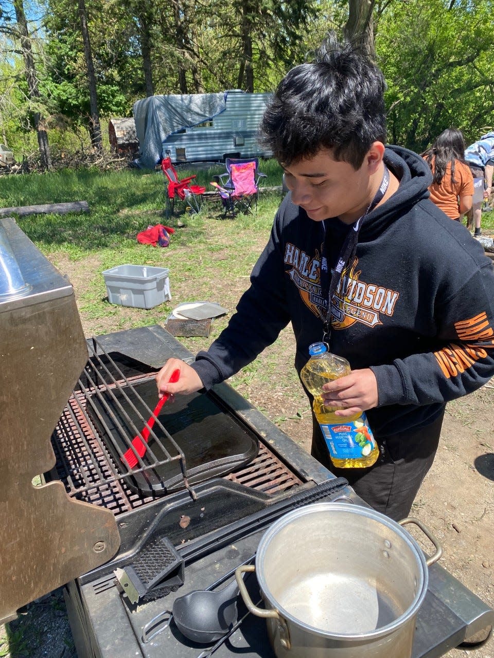 An open flame cooking course during Project Term teaches Black River students cooking skills, food safety and fire safety.