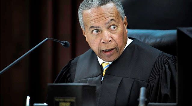 Judge Monte Wilkins reads the charges to the jury during the trial of Corey Batey and Brandon Vandenburg. Photo: AP