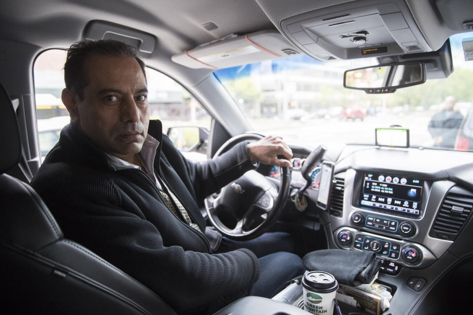 This Friday, May 3, 2019 photo shows Uber driver and NYTWA member Inder Parmar in his vehicle in New York. "The drivers are the one who helped Uber to be $100 billion, nobody else, and the drivers are the ones who are suffering," said Parmar, 54, who lives in a suburb of New York City. "Uber and Lyft, they figured out how to exploit the drivers, and that's what they're doing right now." (AP Photo/Mary Altaffer)