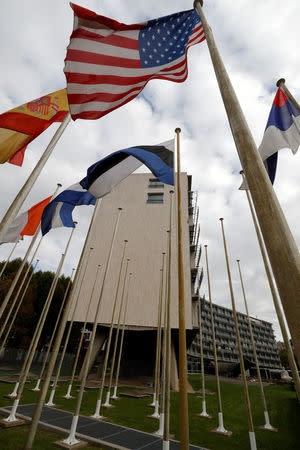 An American flag flies outside the headquarters of the United Nations Educational, Scientific and Cultural Organization (UNESCO) in Paris, France, October 12, 2017. REUTERS/Philippe Wojazer