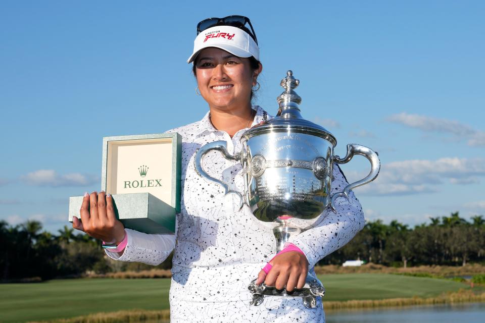 Rolex player of the year Lilia Vu poses with her trophy at the LPGA CME Group Tour Championship golf tournament, Sunday, Nov. 19, 2023, in Naples, Fla. (AP Photo/Lynne Sladky)