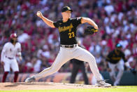 Pittsburgh Pirates starting pitcher Mitch Keller (23) throws against the Cincinnati Reds in the first inning of an opening day baseball game in Cincinnati, Thursday, March 30, 2023. (AP Photo/Jeff Dean)