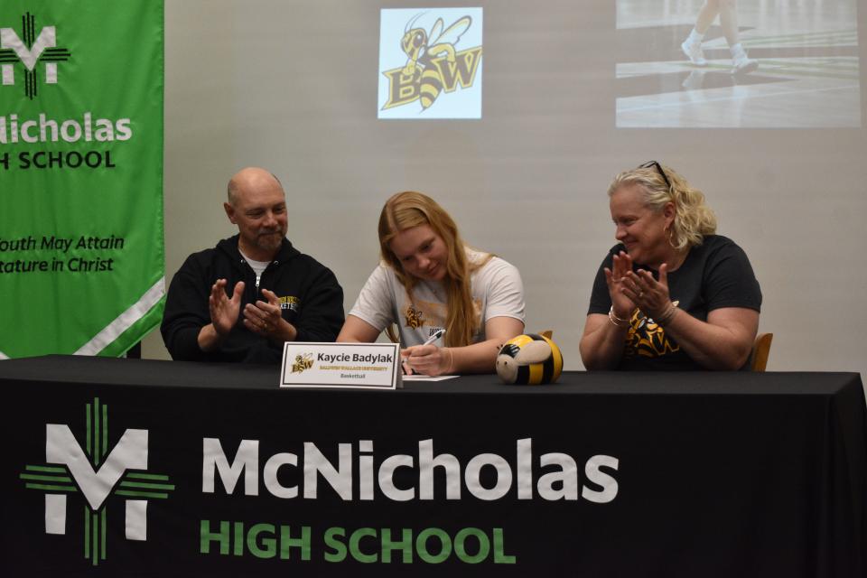 Kaycie Badylak of McNicholas High School signed her letter of intent to play basketball for the Baldwin Wallace University Yellow Jackets. Kaycie was named the GCL-Coed Co-Player of the Year and earned first-team all-district and honorable mention all-state accolades.