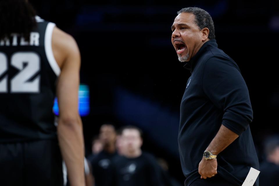 Georgetown Hoyas head coach Ed Cooley yells at officials during a timeout against his ex-team, the Providence Friars, in the second half at Capital One Arena on Tuesday night.