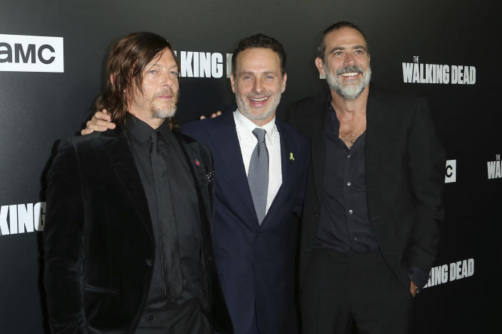 FILE - In this Sept. 27, 2018 file photo, from left to right, Norman Reedus, Andrew Lincoln and Jeffrey Dean Morgan arrive at the LA Premiere of Season 9 of their show "The Walking Dead" in Los Angeles. The network behind the show that’s become synonymous with Georgia says it will “reevaluate” its activity in the state if a new abortion law goes into effect. The Walking Dead’s success has drawn steady streams of tourists to the Georgia towns where it has been filmed. A statement from AMC Networks calls the abortion legislation “highly restrictive” and says it will be closely watching what’s likely to be “a long and complicated fight” over the law. Georgia’s ban on virtually all abortions will take effect next year if it’s not blocked in the courts. (Photo by Willy Sanjuan/Invision/AP, File)